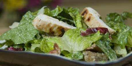 Hail Caesar! [Lightened-up Caesar salad with thick and creamy dressing, crumbled bacon and multigrain croutons]