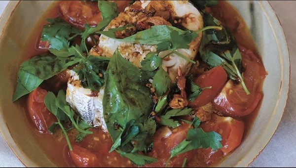 Hake and soft tomatoes with chilli butter