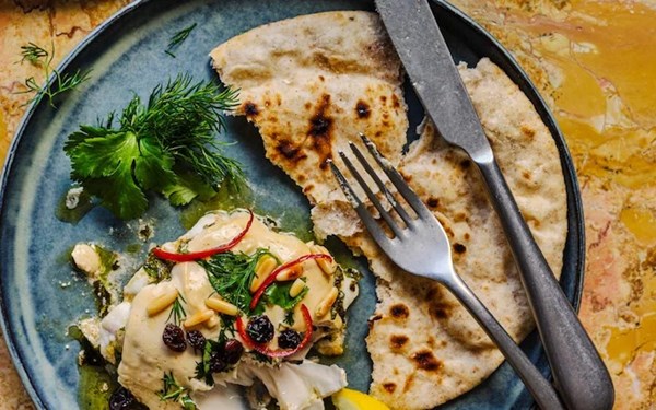 Hake baked in yogurt and tahini