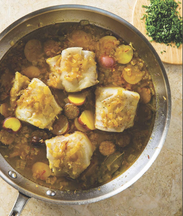 Hake in saffron broth with chorizo and potatoes