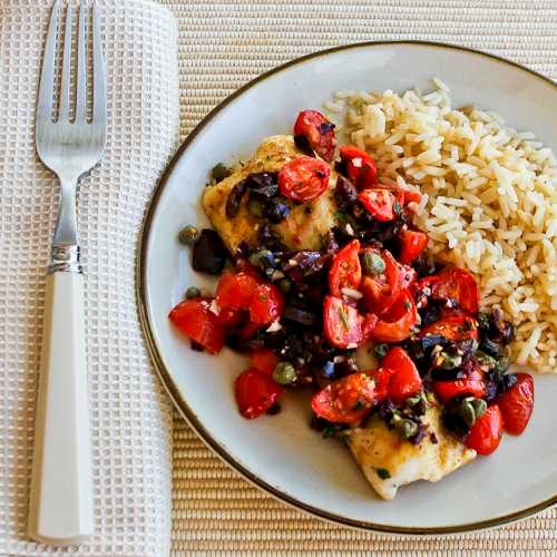 Hake loins baked with tomato, Kalamata olive, and caper salsa