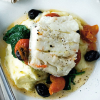 Hake with baby plum tomatoes and olives
