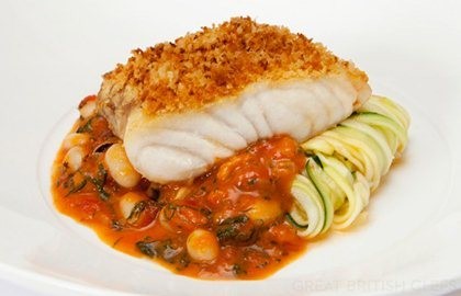 Hake with courgettes, Provençal mussel sauce and crispy breadcrumbs