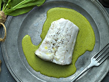 Hake with herb sauce