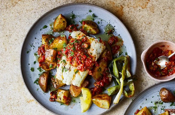 Hake with roast red pepper sauce & charred salad onions 