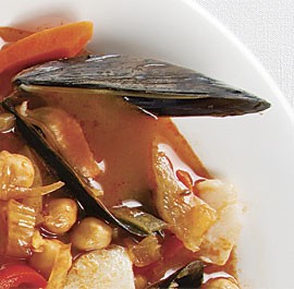 Halibut and mussel stew with fennel, peppers, and saffron