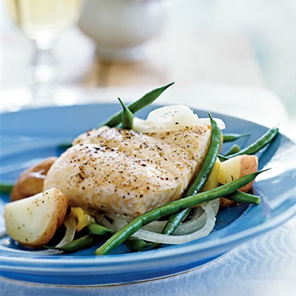 Halibut en papillote with potatoes, green beans, and sweet onions