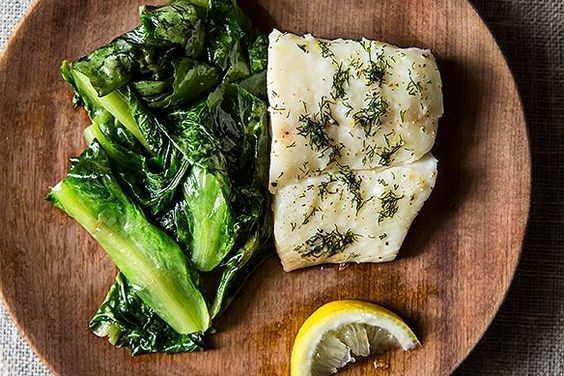 Halibut over wilted escarole
