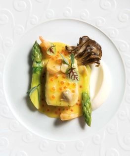 Halibut with celery root puree, hen of the woods, and Riesling cockle sauce