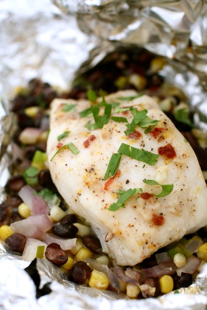 Halibut with chipotle compound butter in foil packets