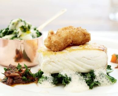 Halibut with monkfish cheek fritter (Fillet of wild halibut cavolo nero colcannon, sage-braised oxtails, monkfish cheek fritter and fish cream)