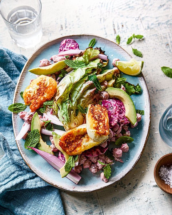 Halloumi and charred hispi cabbage with beetroot and tahini slaw