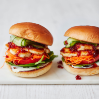 Halloumi burgers with chilli jam, spinach, carrot and cucumber