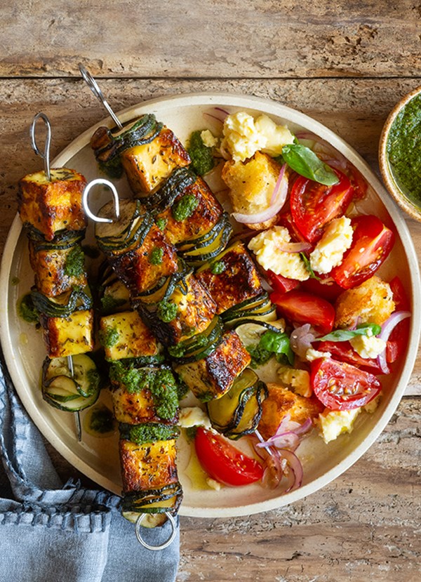 Haloumi and zucchini skewers with tomato panzanella salad 