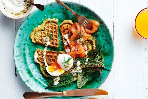 Haloumi and zucchini waffles with smoked salmon and eggs