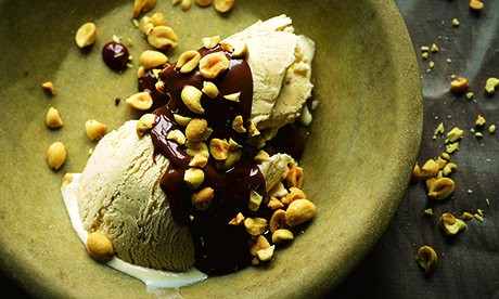 Halva ice cream with chocolate sauce and roasted peanuts