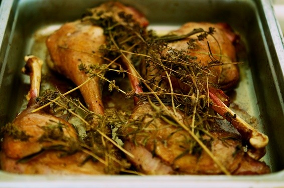 Ham cured goose legs with butter poached peas and carrots
