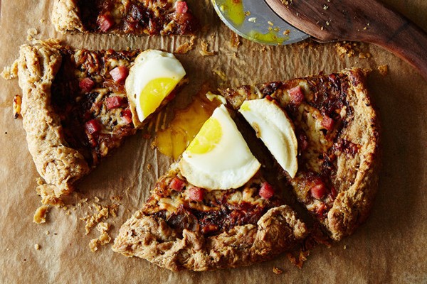 Ham, Gruyère, and caramelized onion galette with a fried egg