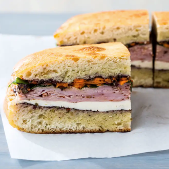 Ham picnic sandwich with olive spread