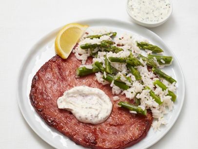 Ham steaks with asparagus-rice salad