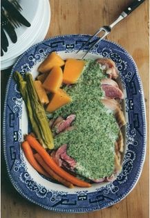 Ham with autumn vegetables in parsley sauce