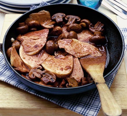 Ham with cranberry and mushroom sauce