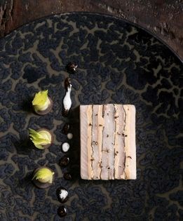 Hamachi, black Périgord truffle, and foie gras mille-feuille with grapes, celeriac, and truffle vinaigrette