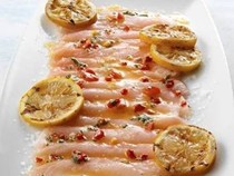 Hamachi carpaccio with piquillo peppers and grilled lemon