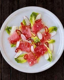 Hamachi crudo with ginger oil and finger limes