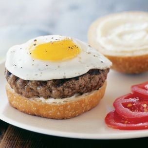Hamburgers with fried eggs
