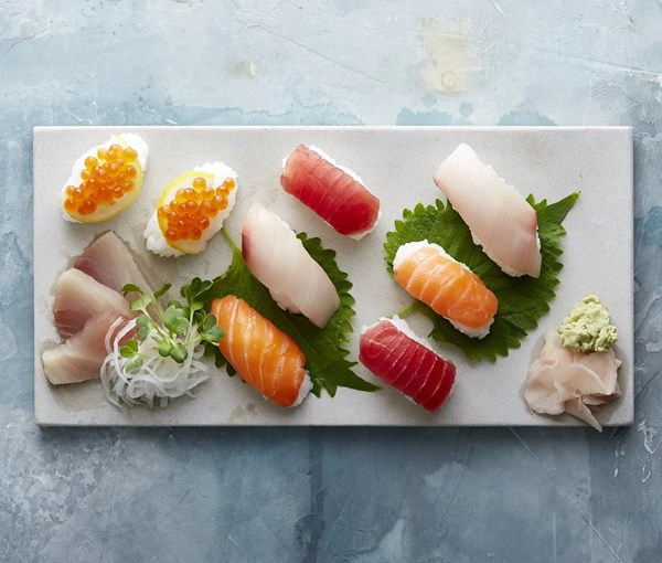 Hand-cut nigiri and sashimi with pickled ginger