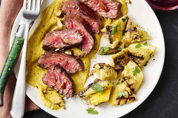 Hanger steak with yellow squash romesco