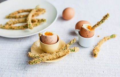 Happy face egg with crispy asparagus soldiers
