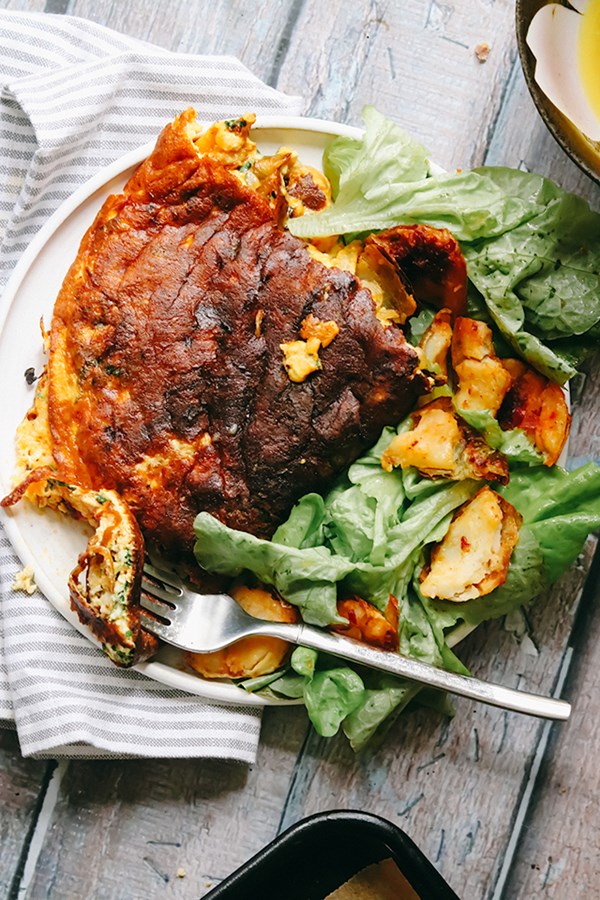Harissa and Manchego omelets with harissa-baked potato skins