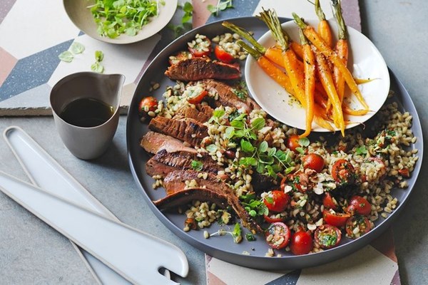 Harissa beef and carrot with barley & tomato salad