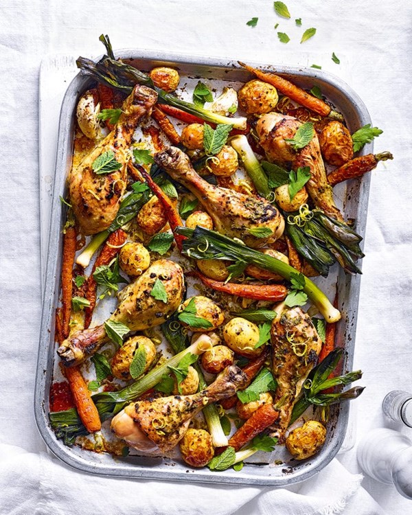 Harissa chicken, new potato and baby heritage carrot traybake