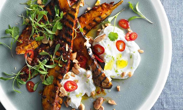 Harissa-glazed aubergine with coconut and peanuts