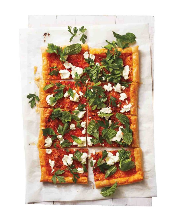 Harissa, goat cheese, and herb tart