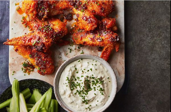 Harissa hot wings with Stilton sauce
