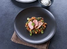 Harissa lamb with spinach and chickpeas
