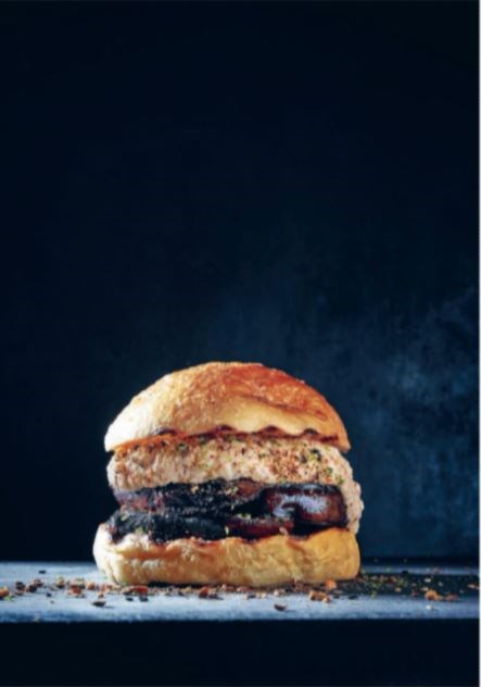 Harissa-marinated aubergine burger with baba ghanoush and dukkah