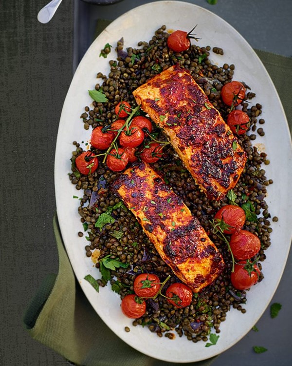 Harissa salmon with green lentils and roast cherry tomatoes 