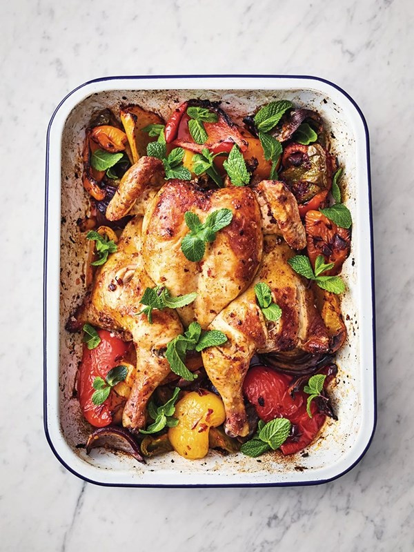 Harissa spatchcock chicken traybake with sweet peppers & fresh mint