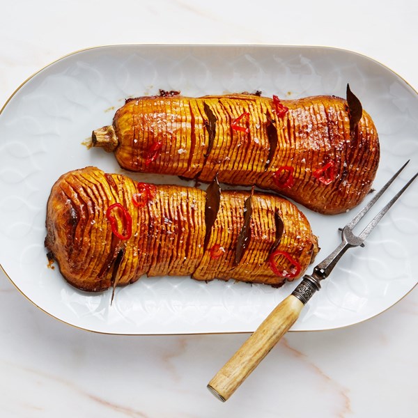 Hasselback butternut squash with bay leaves