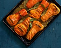 Hasselback butternut squash with bay leaves