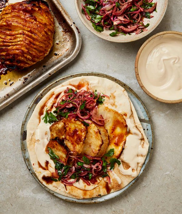 Hasselback celeriac with miso and red onion