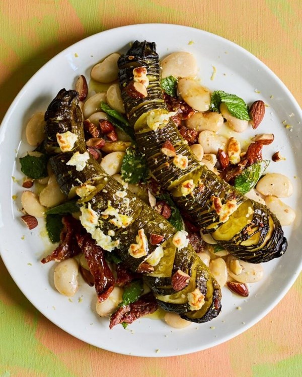 Hasselback courgettes with feta, mint and salted almonds