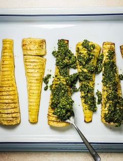Hasselback parsnips with pistachio pesto