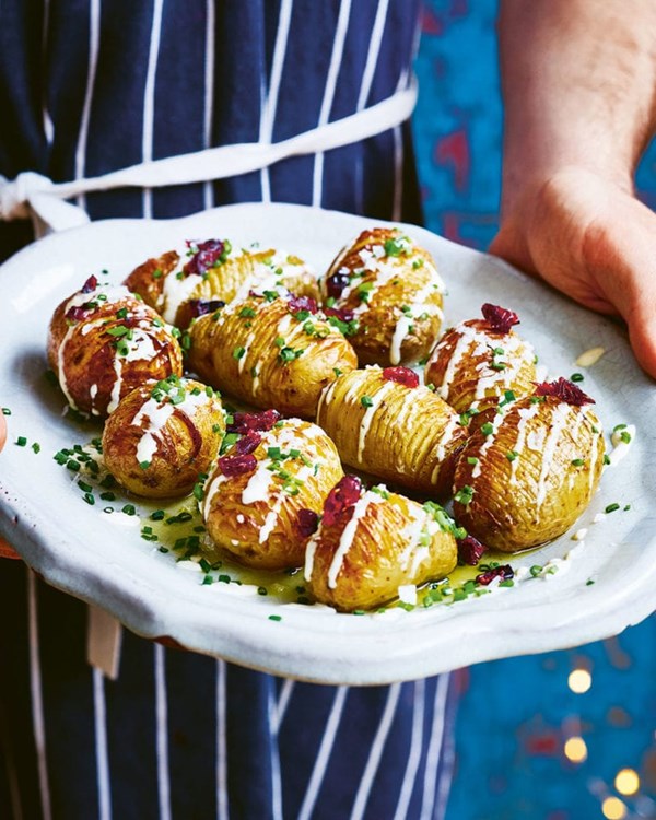 Hasselback potatoes with 'cheese' sauce
