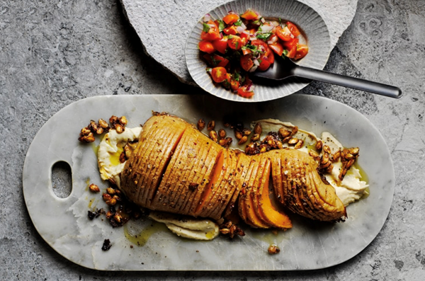 Hasselback pumpkin, tomato salad and white bean hummus